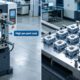 3D rendering comparing a single-cavity mold (high per-part cost) with a multi-cavity mold (over 50% cost savings) in an industrial setting.